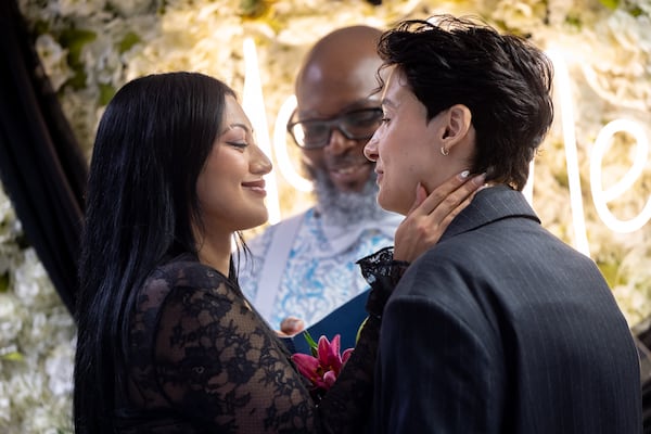 Meray Kaur (left) and Paula Mason are married on Halloween. (Arvin Temkar/AJC)