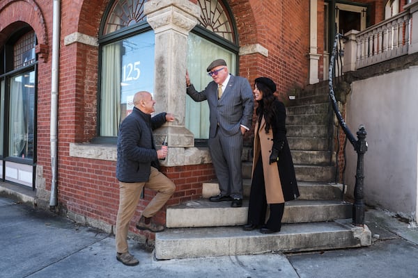 Danny Glusman with Widespread Commercial Group (left) stands with Jeff Notrica and Alison Gordon on the steps of 125 Edgewood Ave. in Atlanta on Thursday, Jan. 15, 2026. (Abbey Cutrer/AJC)