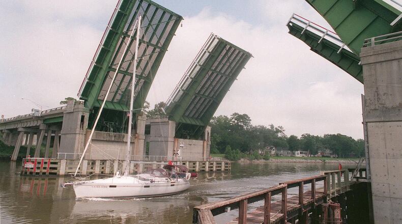 Consider this a case of truthful hyperbole. Cherokee County has really no drawbridge. Below is a 1999 AJC file photo of the drawbridge at Causton Bluff, near Savannah, Ga. AP/Savannah Morning News, John Carrington