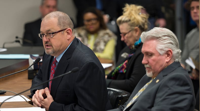 March 15, 2017, Atlanta - Jay Neal, executive director of Georgia's Criminal Justice Coordinating Council, left, and Sen. Greg Kirk,  right, speak on SB 1, which aims to rewrite Georgia's terrorism laws, during a House Judiciary Non-Civil Subcommittee meeting during legislative day 34 in Atlanta, Georgia, on Wednesday, March 15, 2017. (DAVID BARNES / SPECIAL)