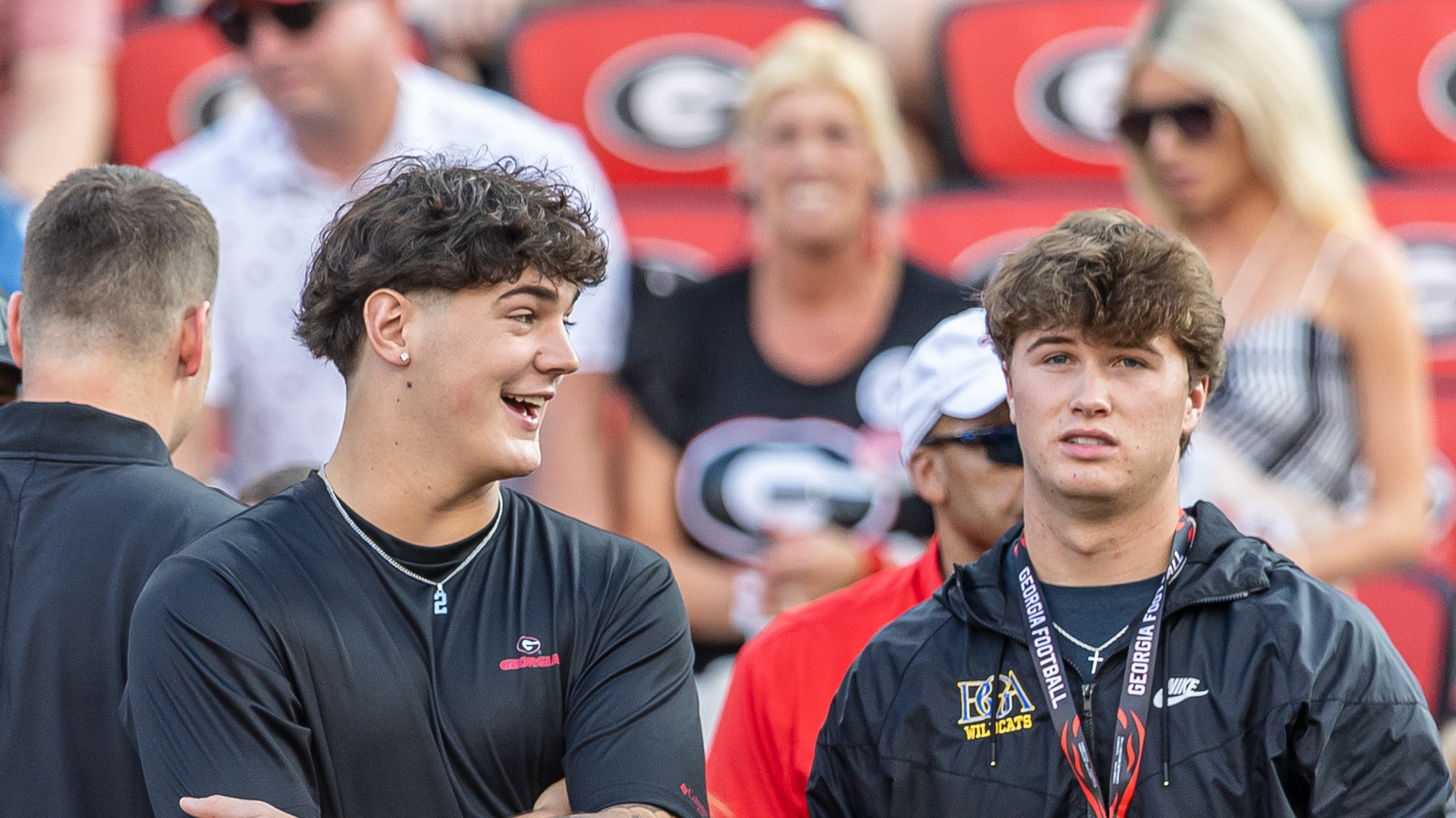 Five-star commit Jared Curtis (left) watches Georgia warm up before their game against Alabama at Sanford Stadium on Saturday, Sept. 26, 2025, in Athens. Curtis is the consensus No. 1 QB prospect in 2026 across all services. (Jeff Sentell/DawgNation)
