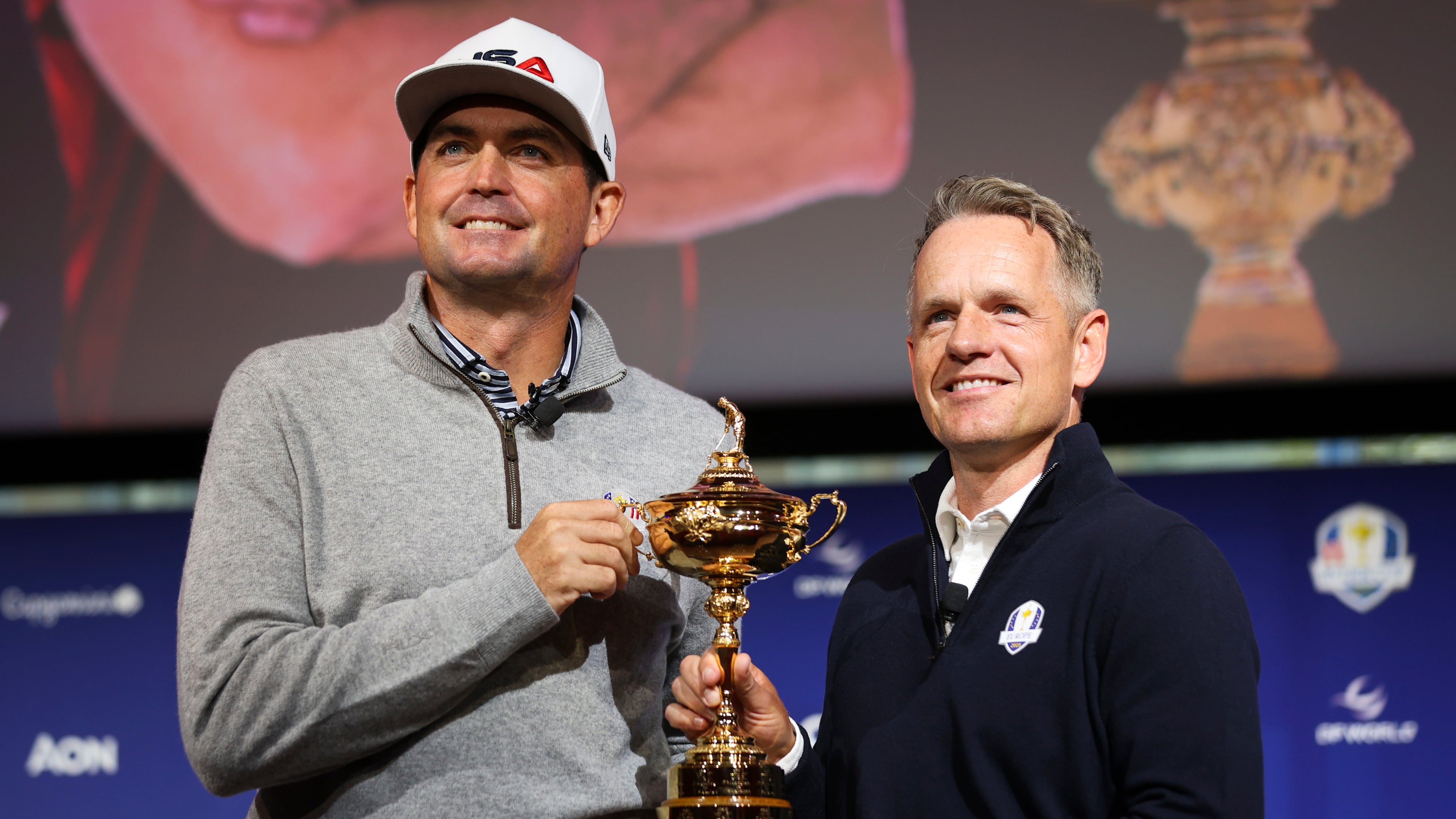 FILE - United States captain Keegan Bradley, left, and Europe captain Luke Donald pose for a photo with the Ryder Cup trophy after a press conference in New York, Tuesday, Oct. 8, 2024, in New York. (AP Photo/Heather Khalifa, File(