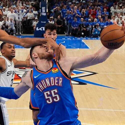 San Antonio Spurs forward Victor Wembanyama (1) defends against Oklahoma City Thunder center Isaiah Hartenstein (55) during the second half of Game 2 in the Western Conference finals NBA basketball playoffs series Wednesday, May 20, 2026, in Oklahoma City. (AP Photo/Nate Billings)