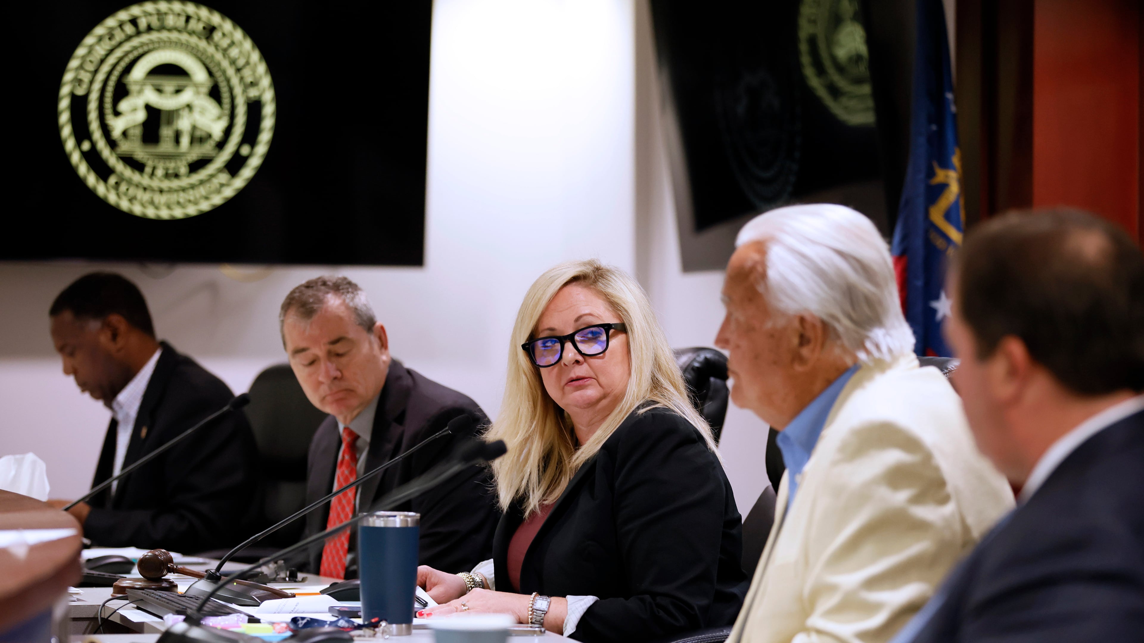 In this AJC file photo, PSC Chairman Tricia Pridemore gazes at commissioners as they cast their votes on a Georgia Power rate increase. (Miguel Martinez/AJC/TNS)