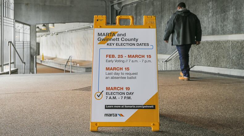 A sign indicating the MARTA and Gwinnett County transit referendum voting calendar is displayed at the MARTA Transit Station in Doraville on February 26, 2019.