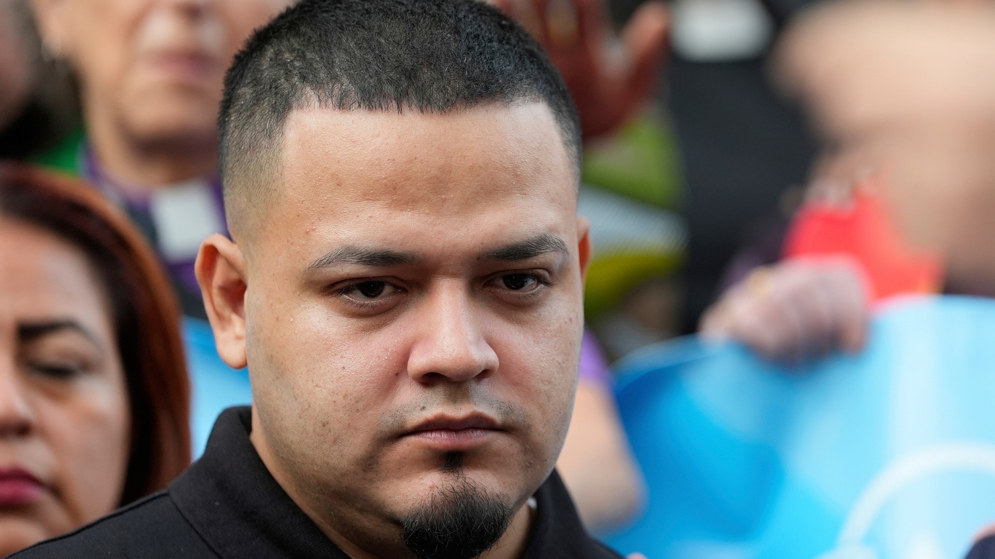 FILE - Kilmar Abrego Garcia joins supporters in a protest rally outside the Immigration and Customs Enforcement field office in Baltimore, Aug. 25, 2025. (AP Photo/Stephanie Scarbrough, File)