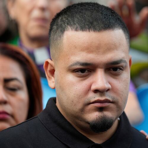 FILE - Kilmar Abrego Garcia joins supporters in a protest rally outside the Immigration and Customs Enforcement field office in Baltimore, Aug. 25, 2025. (AP Photo/Stephanie Scarbrough, File)