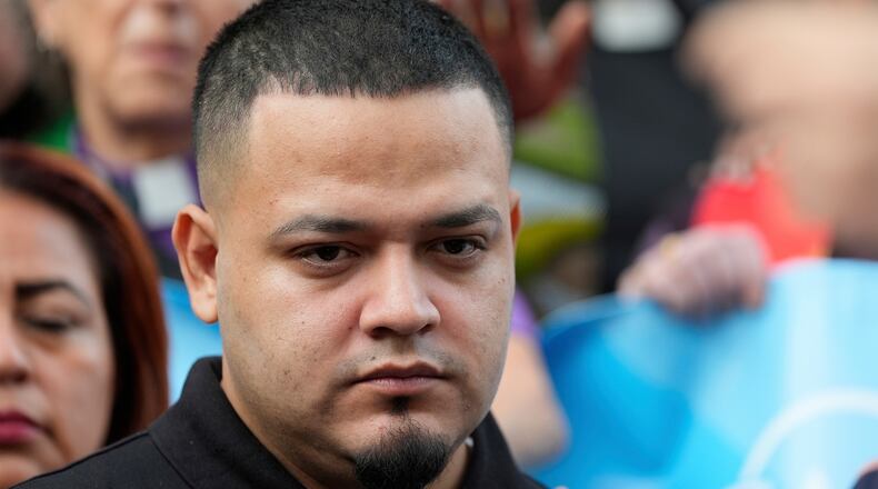 FILE - Kilmar Abrego Garcia joins supporters in a protest rally outside the Immigration and Customs Enforcement field office in Baltimore, Aug. 25, 2025. (AP Photo/Stephanie Scarbrough, File)