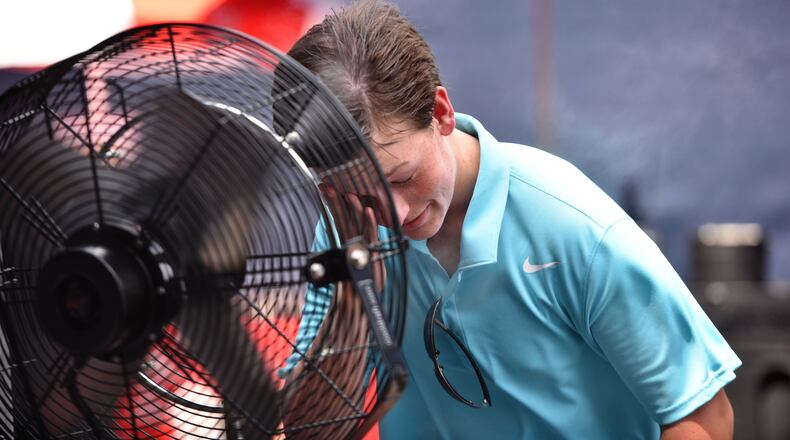 Harry Immel cools off during the BB&T Atlanta Open at Atlantic Station on Wednesday, July 29, 2015.