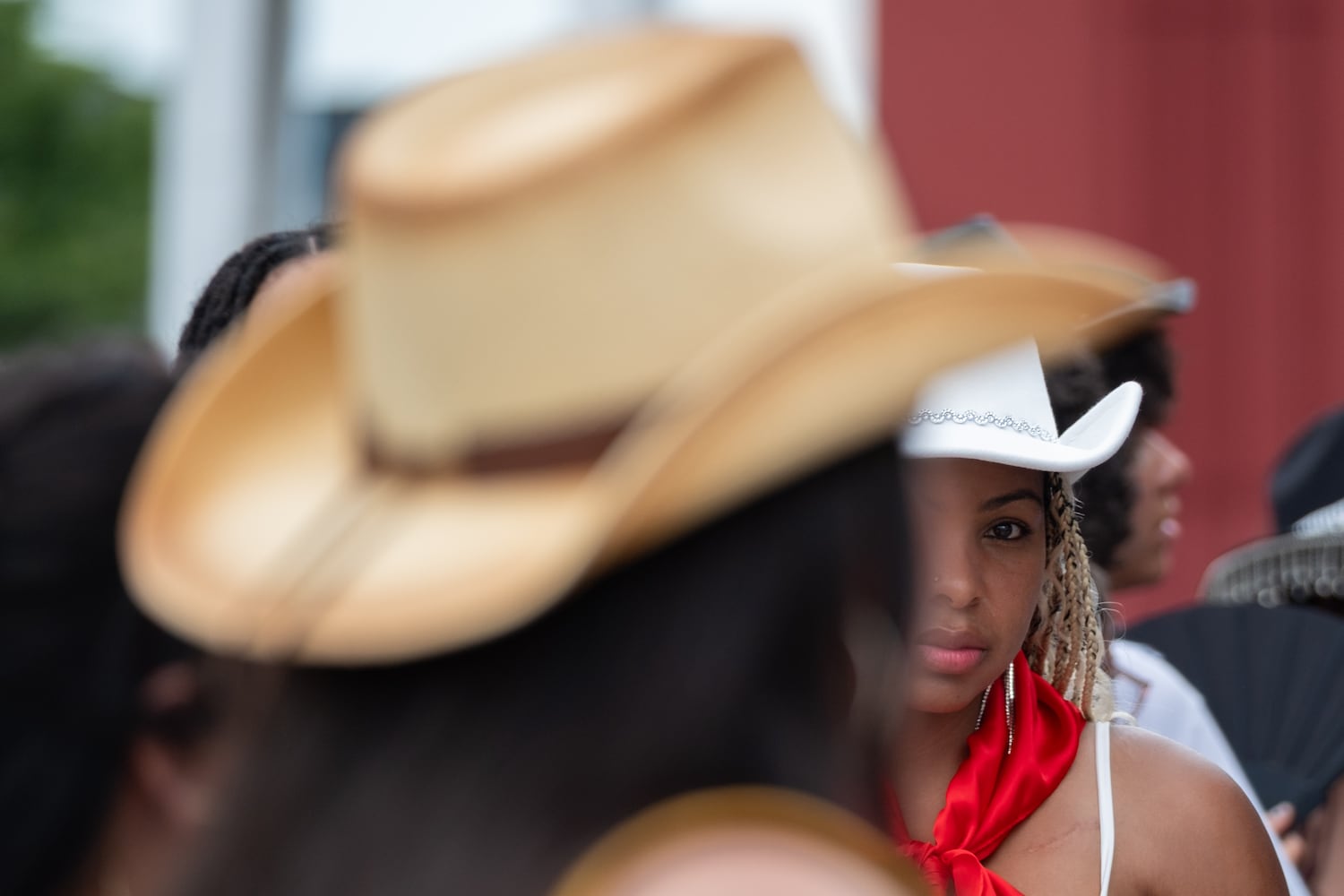 Tasha Hinton, of Mableton, waits in line to buy a t-shirt from the official merchandise vendor before the gates opened for Beyoncè’s “Cowboy Carter” show in Atlanta on Friday, July 11, 2025.   Ben Gray for the Atlanta Journal-Constitution