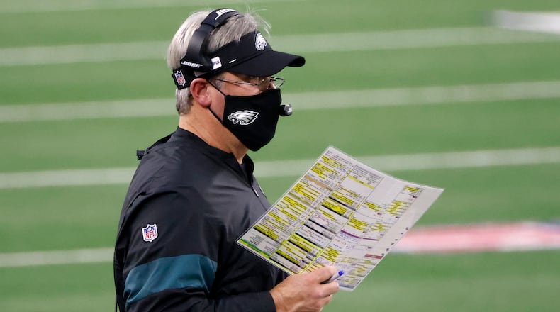 Philadelphia Eagles head coach Doug Pederson watches play against the Dallas Cowboys in the second half Sunday, Dec. 27, 2020, in Arlington, Texas. (Michael Ainsworth/AP)