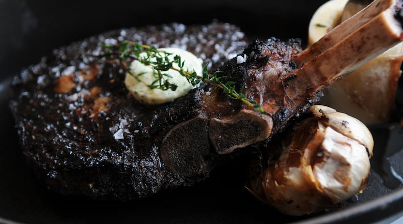 Bone in Ribeye steak at BLT Steak. / AJC file photo