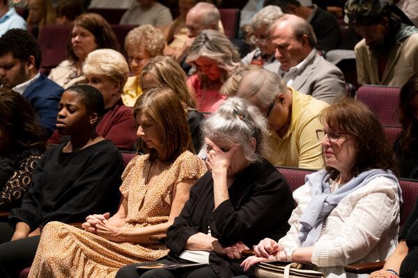 People bow their heads in prayer during the legacy celebration for Dr. Charles Stanley at First Baptist Atlanta on Sunday, April 23, 2023.   (Ben Gray / Ben@BenGray.com)