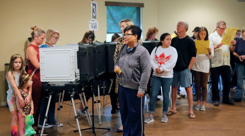 11/6/18 - Roswell - A steady steam of people vote at the St Mary's Orthodox Church in Roswell.   BOB ANDRES / BANDRES@AJC.COM