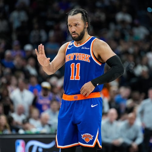 New York Knicks guard Jalen Brunson motions to teammates during the second half of Game 5 of the NBA Finals basketball series against the San Antonio Spurs, Saturday, June 13, 2026, in San Antonio. (AP Photo/Ross D. Franklin)