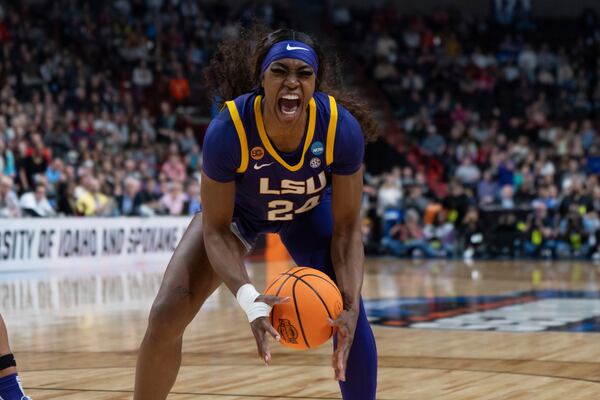 LSU forward Aneesah Morrow (24) reacts after getting a rebound during the second half in the Sweet 16 of the NCAA college basketball tournament against North Carolina State, Friday, March 28, 2025, in Spokane, Wash. (AP Photo/Jenny Kane)