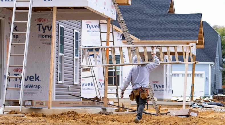 Overall sales of homes are down, but demand is still strong so the problem is largely because of a shortage in home resales. That has made new construction a bigger part of the metro Atlanta housing market. (Jim Watson/AFP via Getty Images/TNS)