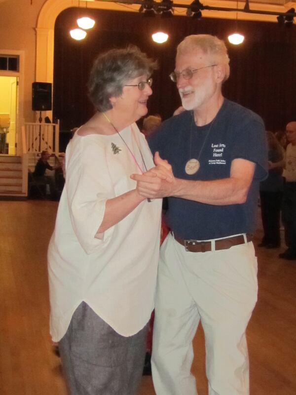 Susan Davis (left) and Scott Russell at a contra dance (Courtesy of Brett Erickson)