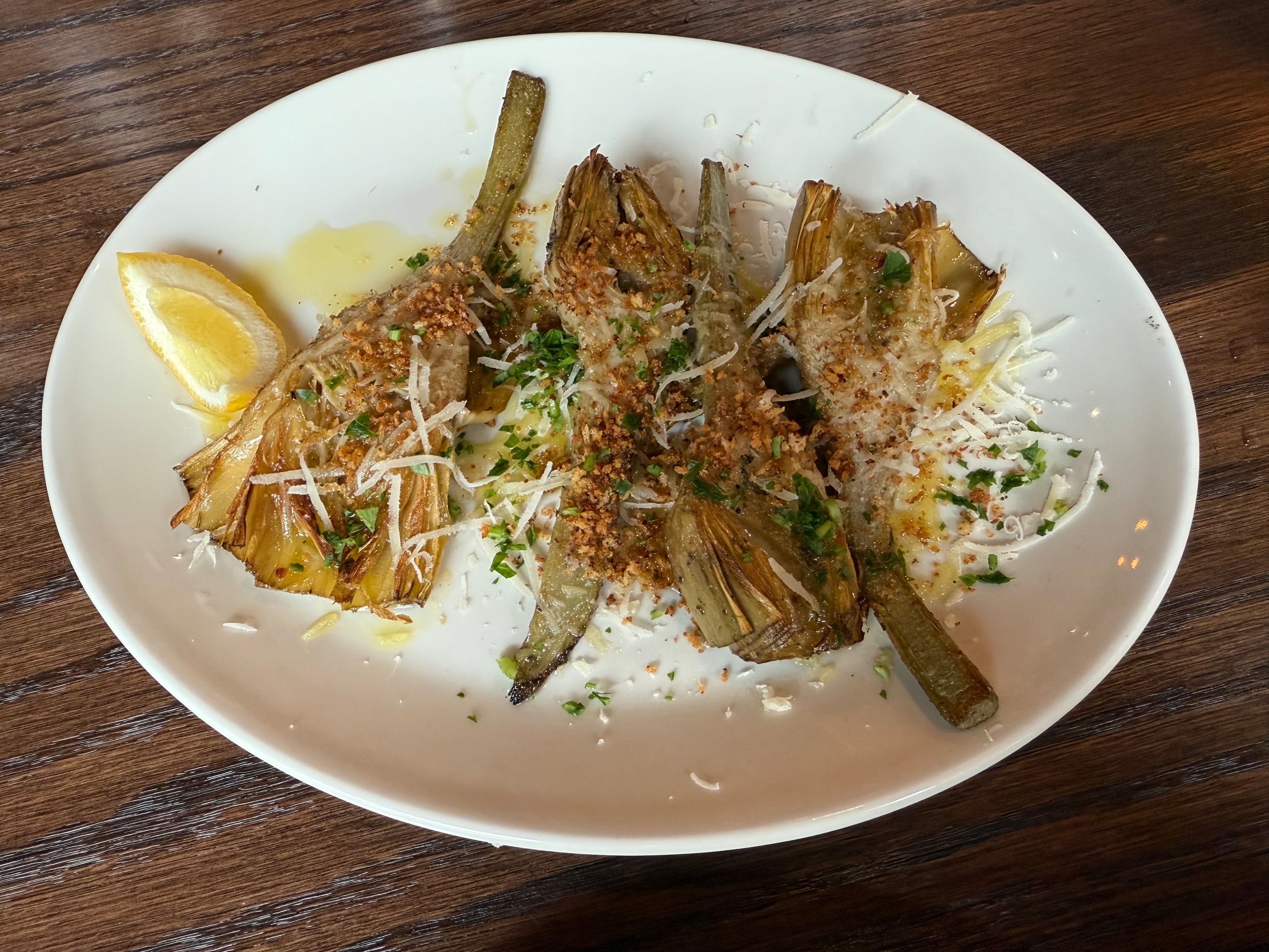 Coal-roasted artichokes at Krog Bar. (Angela Hansberger for the AJC)