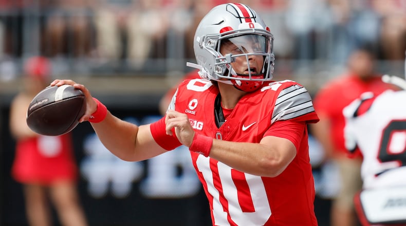 Ohio State quarterback Julian Sayin throws a pass against Ball State during the first half of an NCAA college football game, Saturday, Sept. 5, 2026, in Columbus, Ohio. (AP Photo/Jay LaPrete)
