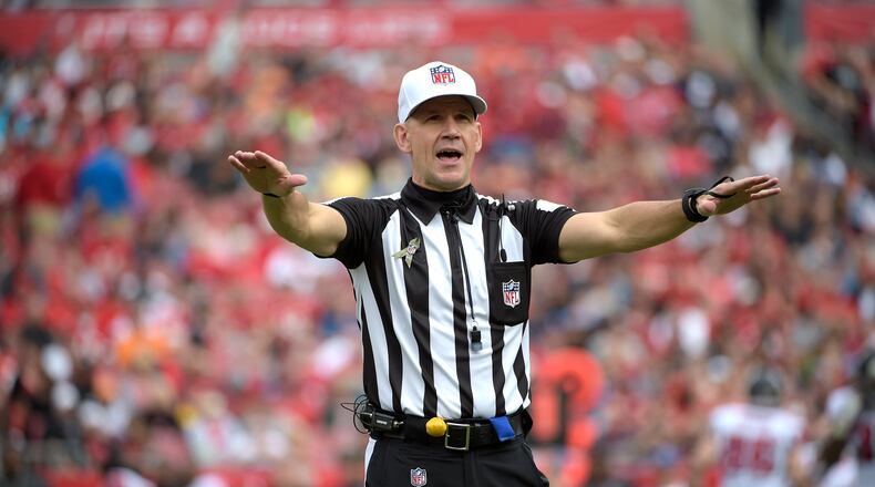 FILE - In this Sunday, Nov. 9, 2014 file photo, official Clete Blakeman calls a penalty during the first half of an NFL football game between the Tampa Bay Buccaneers and Atlanta Falcons in Tampa, Fla. The NFL announced Wednesday, Jan. 27, 2016 that eighth-year referee Clete Blakeman will work his first Super Bowl on Feb. 7 when the Carolina Panthers play the Denver Broncos at Santa Clara, California. (AP Photo/Phelan M. Ebenhack, File)