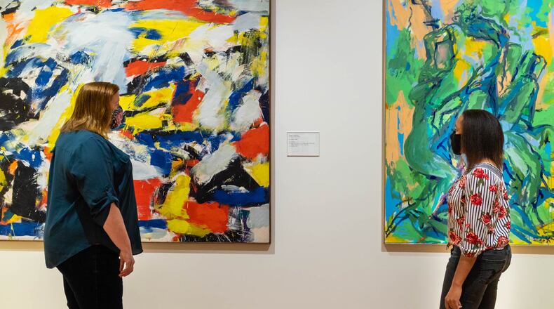 Visitors view art by Angelo Ippolito and Elaine de Kooning at the Georgia Museum of Art on the UGA campus in Athens. Admission to more than 1,000 museums around the country, including the Georgia Museum, will be free on Museum Day, Sept. 18. Staff photo