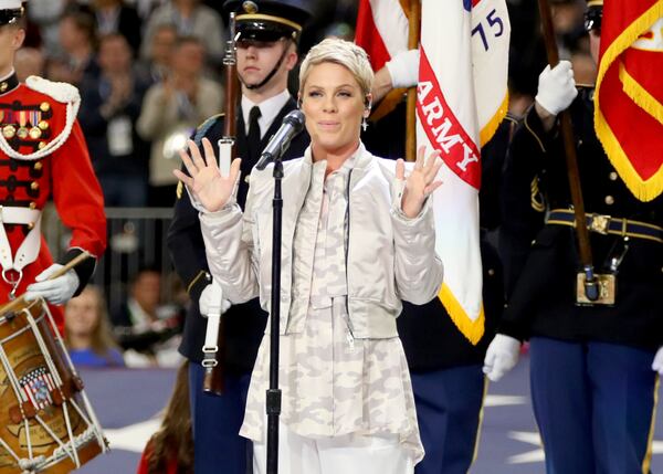 FILE PHOTO: Recording artist Pink performs the National Anthem during the Super Bowl LII Pregame show at U.S. Bank Stadium on February 4, 2018 in Minneapolis, Minnesota.  (Photo by Christopher Polk/Getty Images)