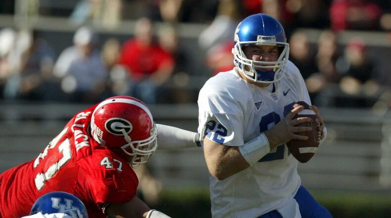 Jared Lorenzen (right) tries to elude Georgia's David Pollack.