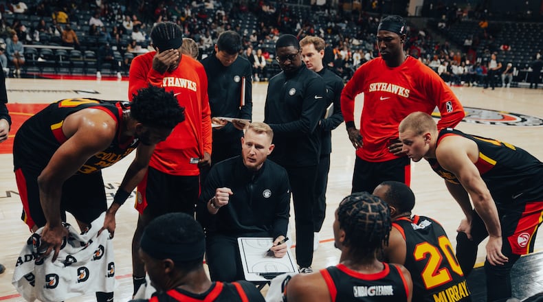 Steve Klei, center, is head coach of the College Park Skyhawks, the Atlanta Hawks' affiliate in the NBA G League, and plays an important role in the Hawk's developmental program. (Photo by College Park Skyhawks/Chris Doomes)