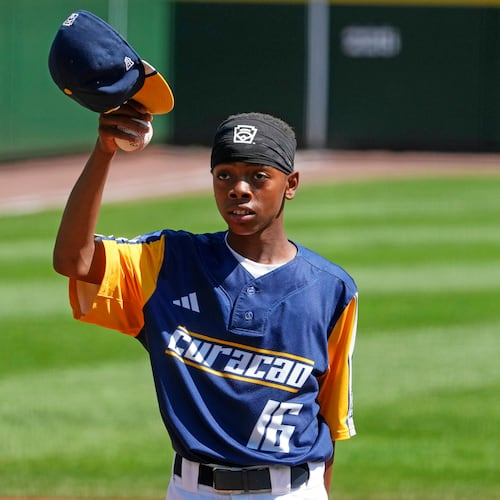 Curacao's Jaymiell Martina (16) tips his cap after reaching his pitch count limit during the sixth inning of the International Championship baseball game Japan at the Little League World Series tournament in South Williamsport, Pa., Saturday, Aug. 29, 2026. (AP Photo/Gene J. Puskar)