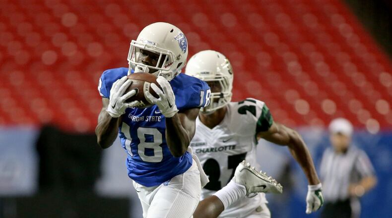 Georgia State Panthers wide receiver Penny Hart (18) catches a 53-yard touchdown pass in the fourth quarter of their game against the Charlotte 49ers at the Georgia Dome, September 4, 2015, in Atlanta. The sophomore will be redshirted and is out for the rest of the season with a broken foot. PHOTO / JASON GETZ
