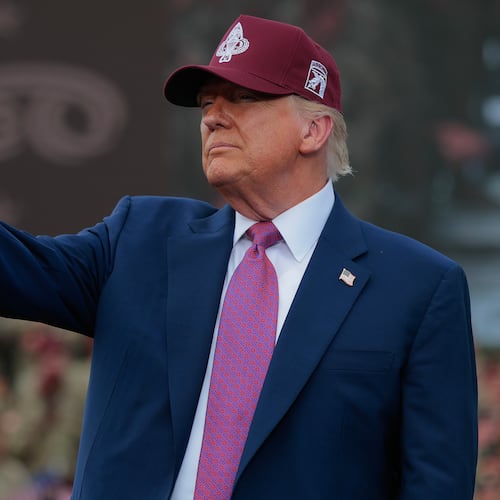 President Donald Trump takes the stage during a rally with U.S. Army troops on June 10, 2025, at Fort Bragg, North Carolina. (Anna Moneymaker/Getty Images/TNS)