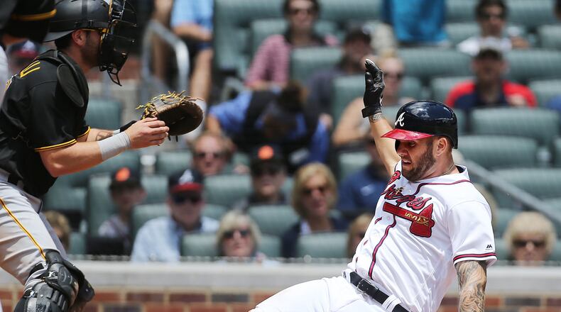 First baseman Matt Adams had a swollen knee Wednesday and was out of the Braves lineup for the first time in 11 games since being traded from the Cardinals to fill in for injured slugger Freddie Freeman. (Curtis Compton/AJC file photo)