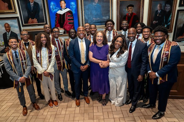 Oprah Winfrey poses with Morehouse College students who were recipients of her endowed scholarship program on Friday, April 24, 2026. (Courtesy of Morehouse College)