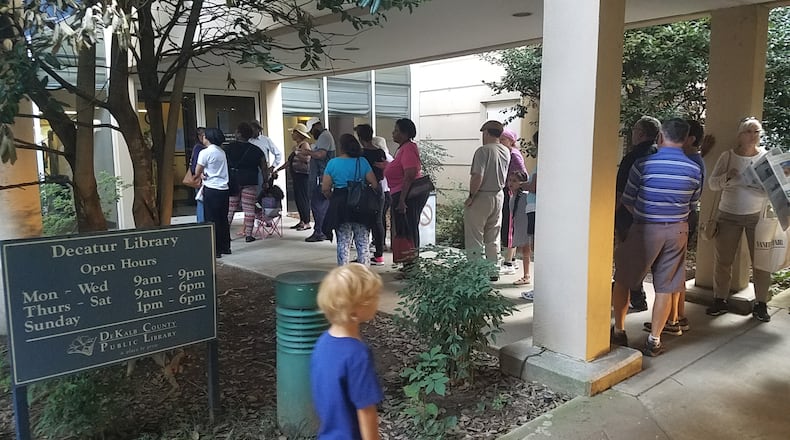 Hundreds lined up for free eclipse glasses at the Decatur public library Saturday. (Photo by me)