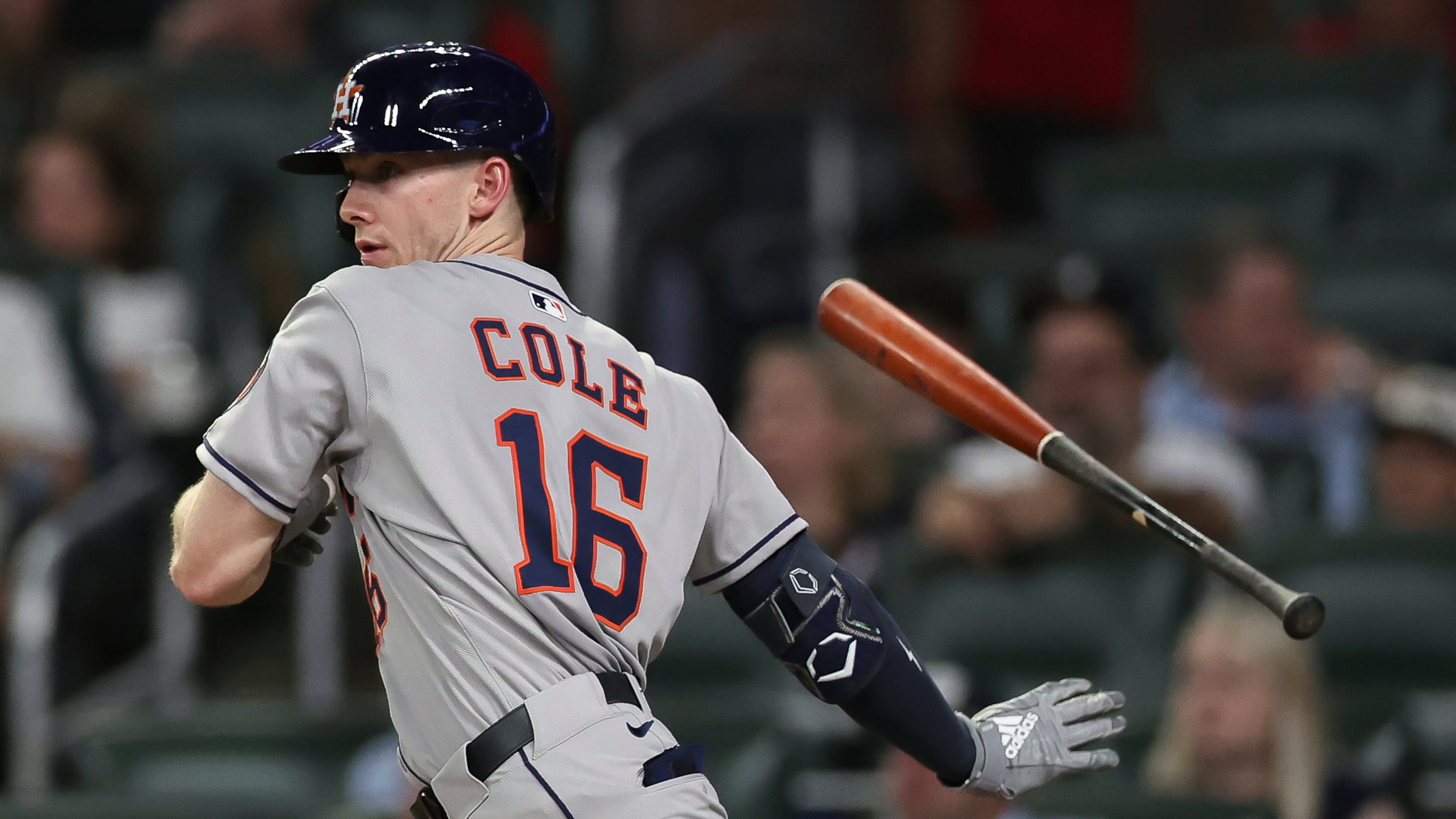 Houston Astros' Zach Cole flips away his bat after hitting an RBI single in the fourth inning of a baseball game against the Atlanta Braves, Friday, Sept. 12, 2025, in Atlanta. (AP Photo/Colin Hubbard)