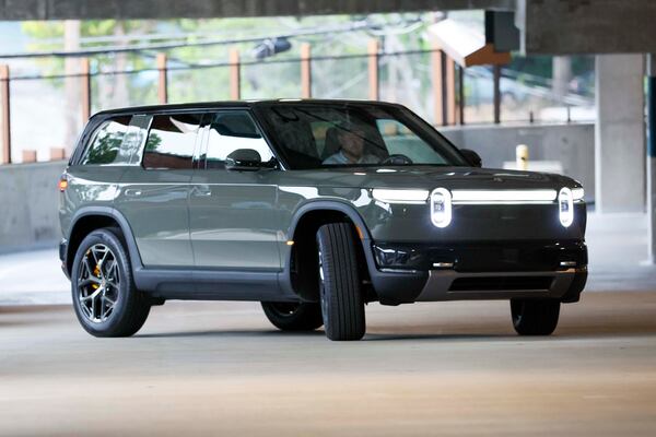 A Rivian R2 model is seen on a parking deck at Rivian’s East Coast headquarters in Atlanta on Tuesday, Aug. 4, 2026. Rivian’s headquarters has 130 employees and is expected to grow to 500 by 2030. (Miguel Martinez/AJC)