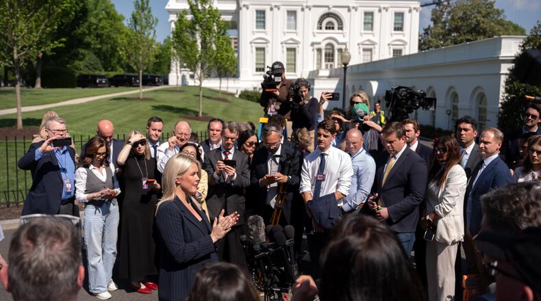 White House press secretary Karoline Leavitt speaks with reporters outside the White House, Wednesday, April 22, 2026, in Washington. (AP Photo/Mark Schiefelbein)