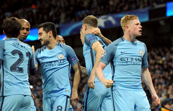 FILE - Manchester City's scorer Kevin De Bruyne, right, and his teammates celebrate their side's 2nd goal during the Champions League group C soccer match between Manchester City and Barcelona at the Etihad stadium in Manchester, England, Tuesday, Nov. 1, 2016. (AP Photo/Rui Vieira, file)