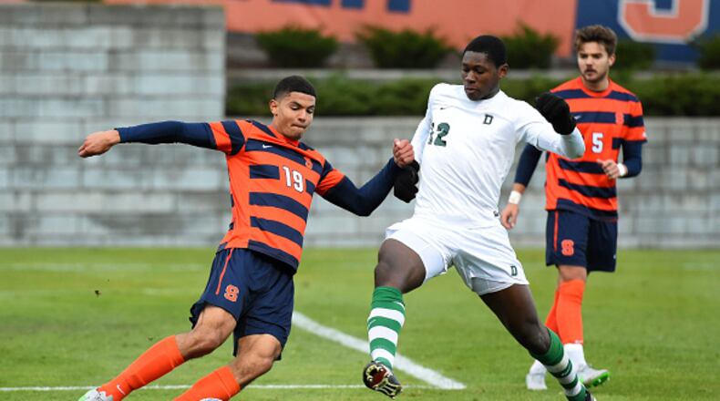 Miles Robinson #19 of the Syracuse Orange controls the ball as Eduvie Ikoba #12 of the Dartmouth Big Green defends during the second half at the SU Soccer Stadium on November 22, 2015 in Syracuse, New York. Syracuse defeated Dartmouth 2-1. (Photo by Rich Barnes/Getty Images)