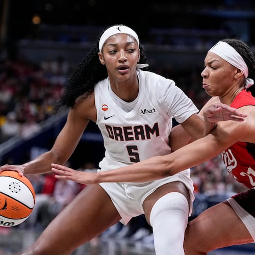 Atlanta Dream forward Angel Reese (5) works around Indiana Fever forward Makayla Timpson (21) in the second half of a WNBA basketball game in Indianapolis, Thursday, June 18, 2026. Reese led the Dream with 21 points and added 11 rebounds on Thursday night. (Michael Conroy/AP)