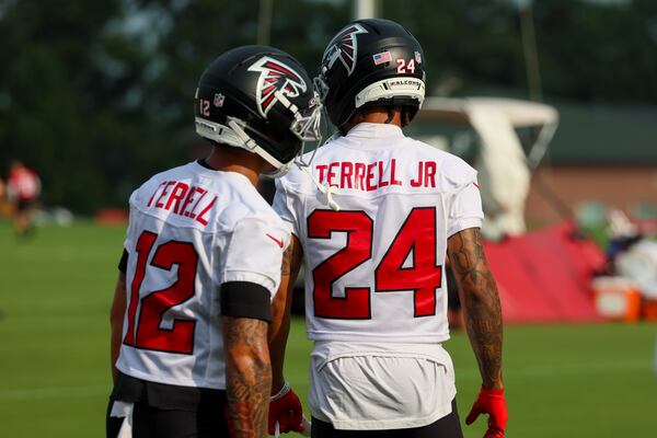 Atlanta Falcons defensive backs Avieon Terrell (12) and  A.J. Terrell Jr. (24, brothers) participates in the first day of training camp at the Atlanta Falcons Training Facility, Wednesday, July 29, 2026, in Flowery Branch, Ga. (Jason Getz/AJC)