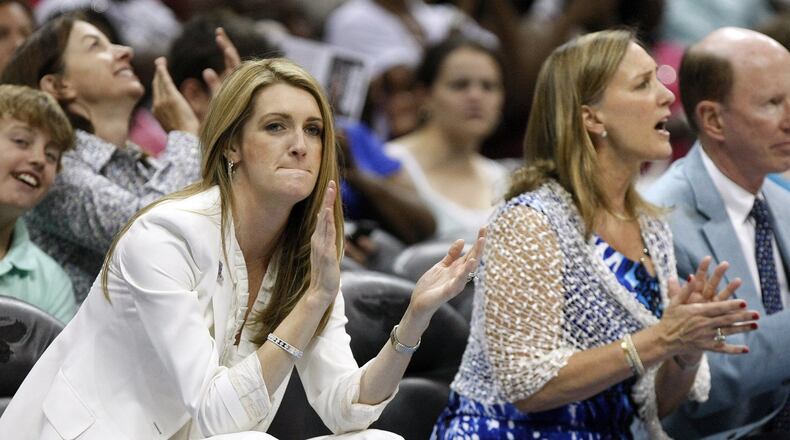 Kelly Loeffler, left, a co-owner of the WNBA’s Atlanta Dream and the head of the Bakkt financial services firm, was among the last to apply to fill U.S. Sen. Johnny Isakson’s website. Gov. Brian Kemp shut down the application process Monday. Curtis Compton ccompton@ajc.com