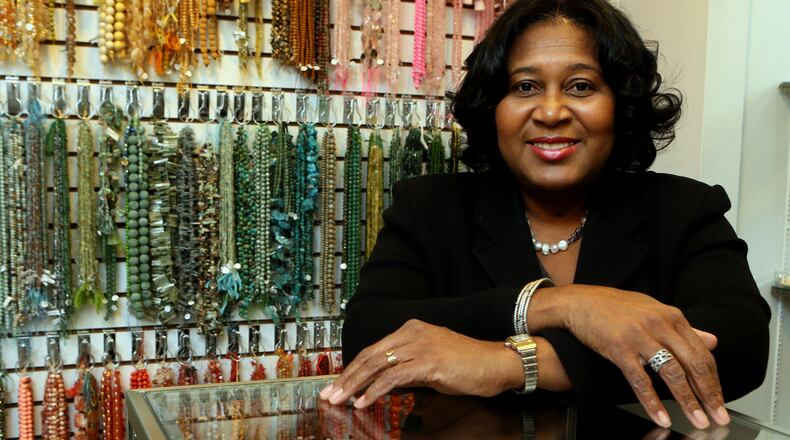 Small business owner Leila Prioleau thinks the Braves' move to Cobb will boost business at her Beads on the Vine shop at the Cobb Galleria Centre.