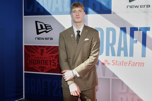 Kasparas Jakucionis arrives for the first round of the NBA basketball draft, Wednesday, June 25, 2025, in New York. (AP Photo/Adam Hunger)