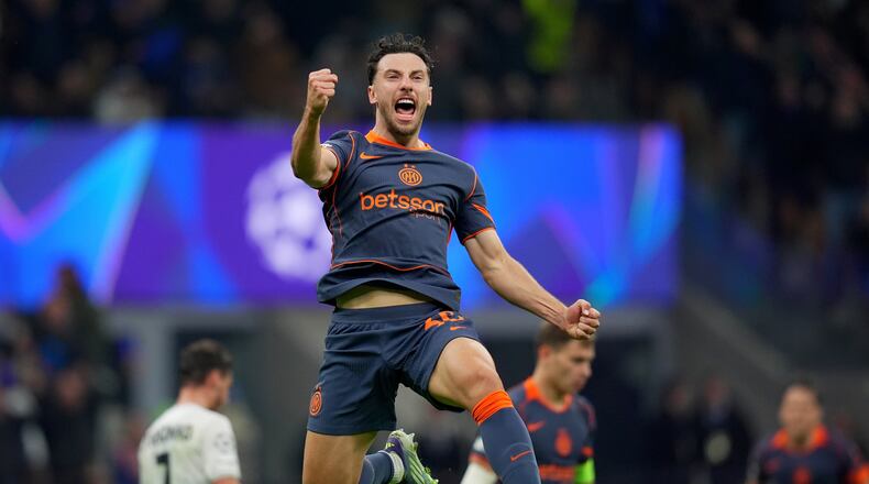 Inter Milan's Carlos Augusto celebrates after scoring during the Champions League soccer match between Inter Milan and Kairat, Wednesday, Nov. 5, 2025, in Milan, Italy. (Spada/LaPresse via AP)