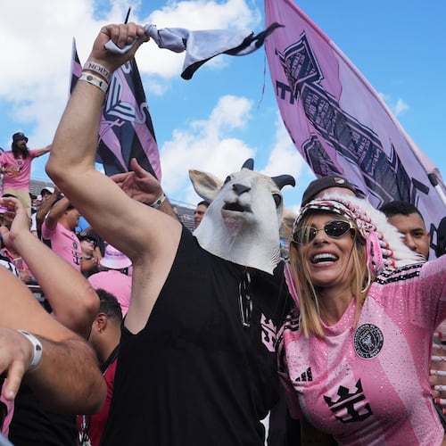 Inter Miami fans cheer before the MLS Cup final soccer match against the Vancouver Whitecaps Saturday, Dec. 6, 2025, in Fort Lauderdale, Fla. (AP Photo/Marta Lavandier)