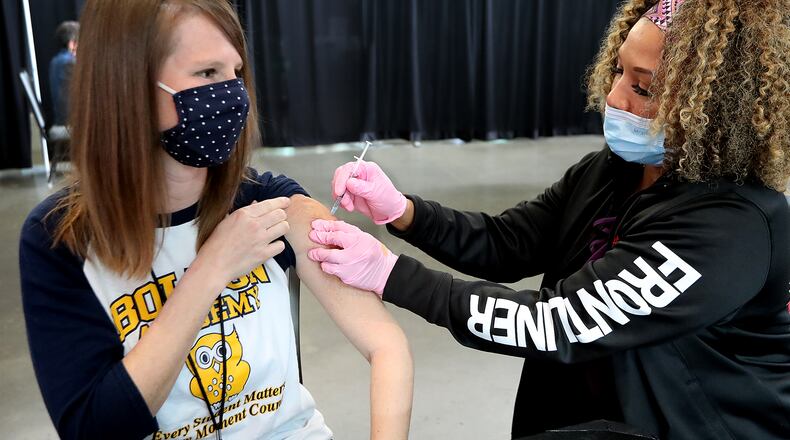 Melanie Haley is among roughly 1,200 Atlanta Public Schools' employees to get a COVID-19 vaccine during a mass vaccination event in March. APS this year expanded its health services department to assist with responding to the pandemic. (Curtis Compton / AJC FILE PHOTO)