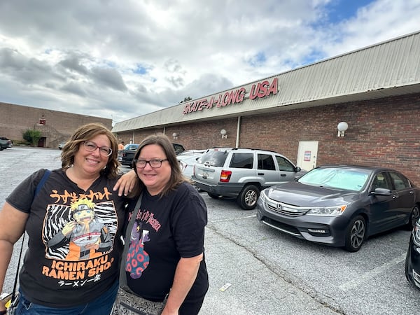 Tracy Thompson and Kelly Little heard that Skate Along USA was closing so they showed up to say goodbye on Aug. 10, 2025 about 40 years after they used to regularly visit in middle school. (Rodney Ho/AJC)