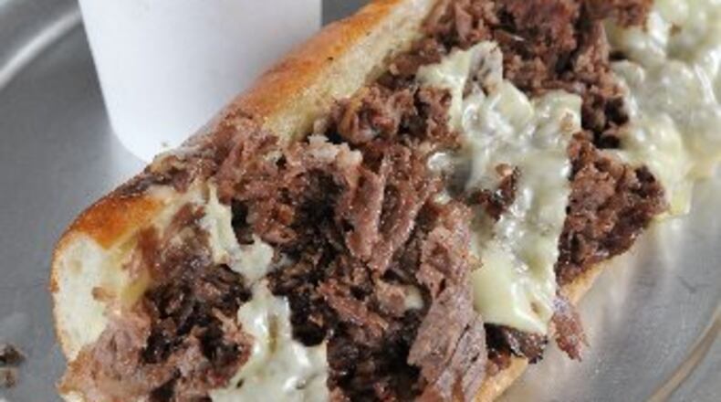 TGM Bakery, opening Jan. 4, will provide the bread for The General Muir, Fred's Meat & Bread, Yalla and sister restaurant West Egg Cafe. Pictured: Cheesesteak and garlic fries at Fred's Meat & Bread. (Beckysteinphotography.com)